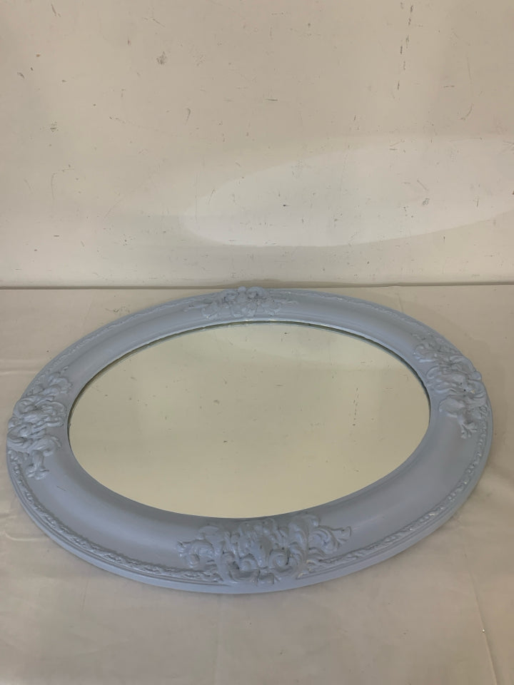 LIGHT BLUE PAINTED OVAL MIRROR EMBOSSED DESIGNS.