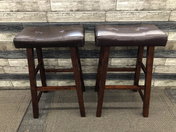 2 LEATHER SADDLE BAR STOOLS.