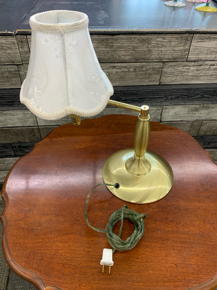 GOLD ADJUSTABLE ARM LAMP W/ SMALL WHITE SHADE.