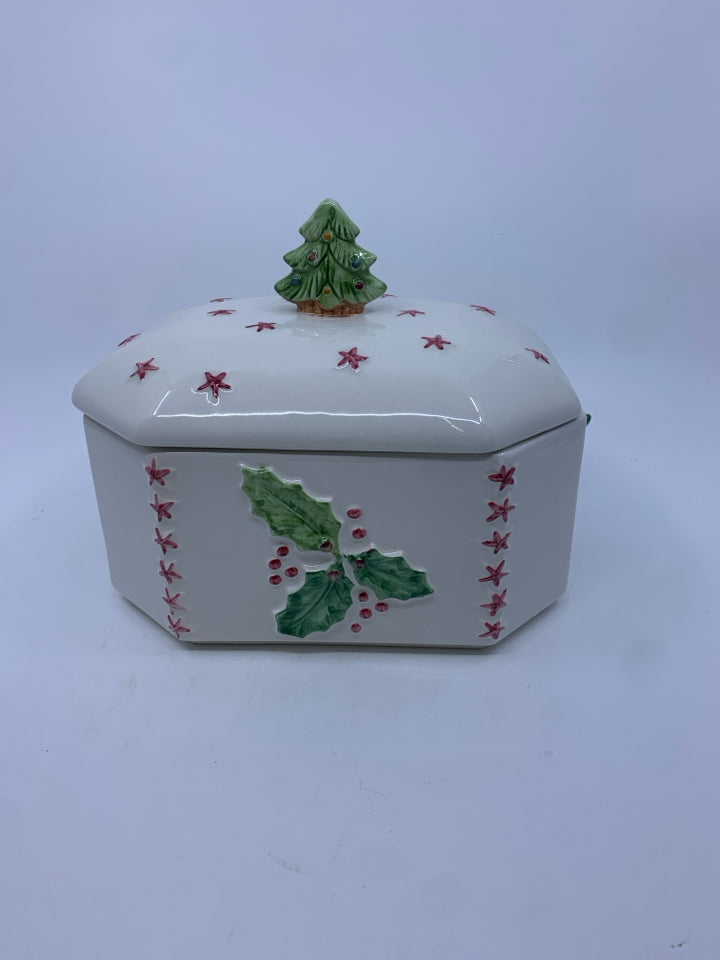 WHITE CERAMIC W HOLLY COOKIE JAR WITH TREE TOPPER LID.