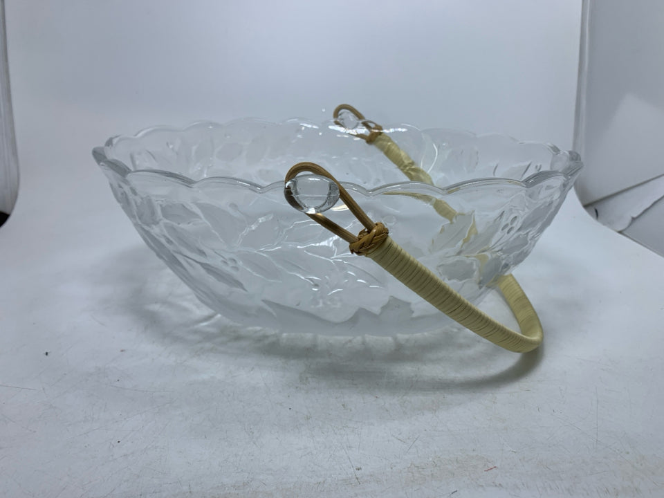 EMBOSSED POINSETTIA OVAL GLASS BASKET W/ WOOD HANDLE.