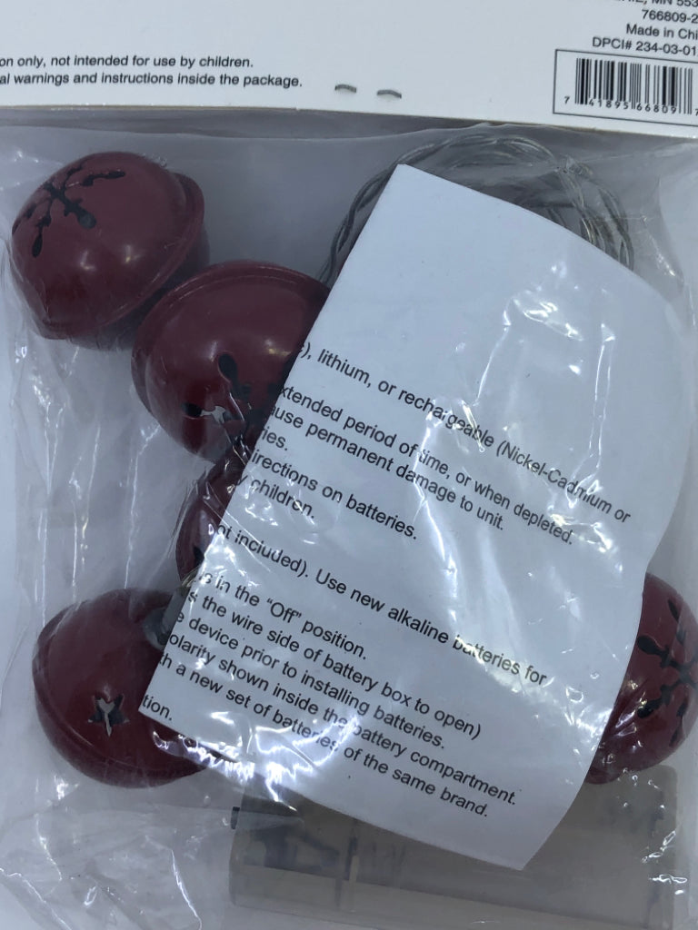 NIP RED LIGHTED JINGLE BELLS.