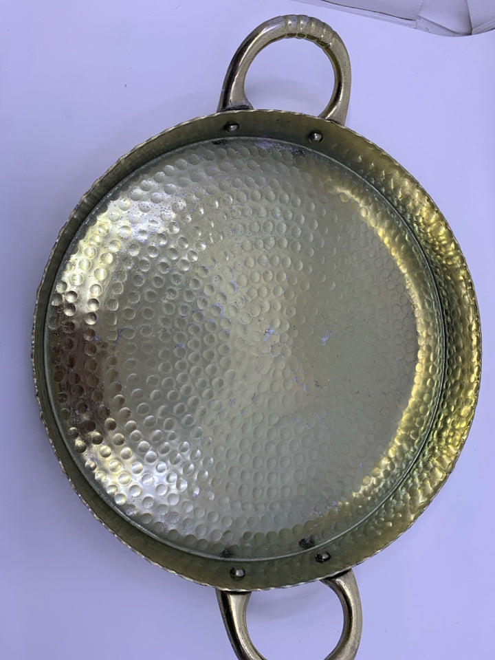GOLD ROUND HAMMERED METAL TRAY W HANDLES.