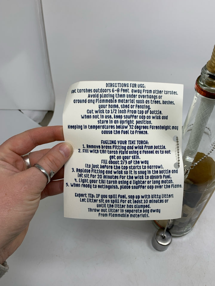 TITO'S VODKA BOTTLE TIKI TORCH W/ DIRECTIONS.