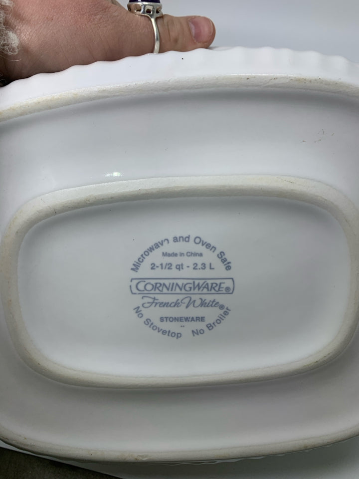 OVAL COVERED CASSEROLE RIBBED DISH.