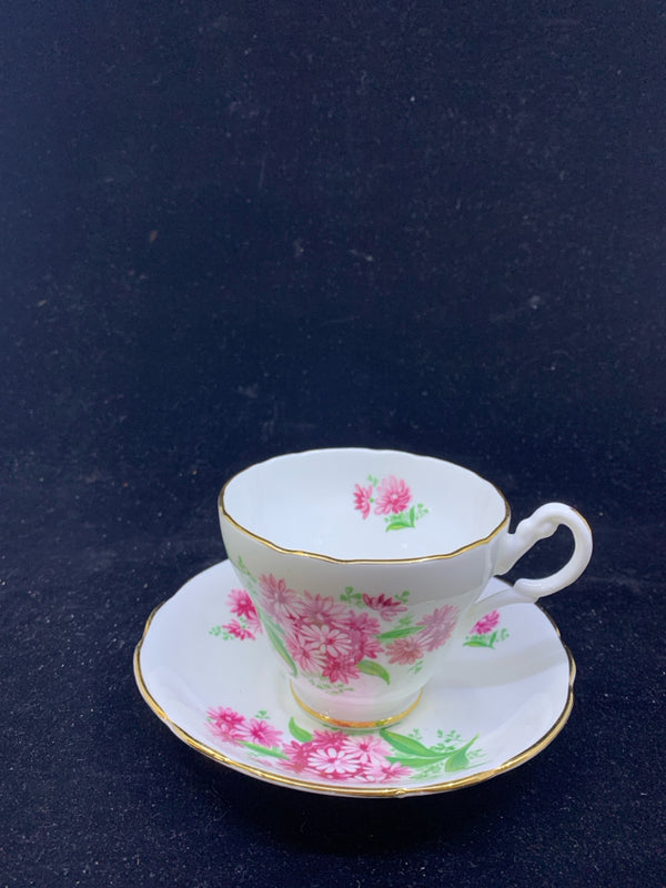 REGENCY TEACUP AND SAUCER W/ PINK FLOWERS AND GREEN LEAVES.