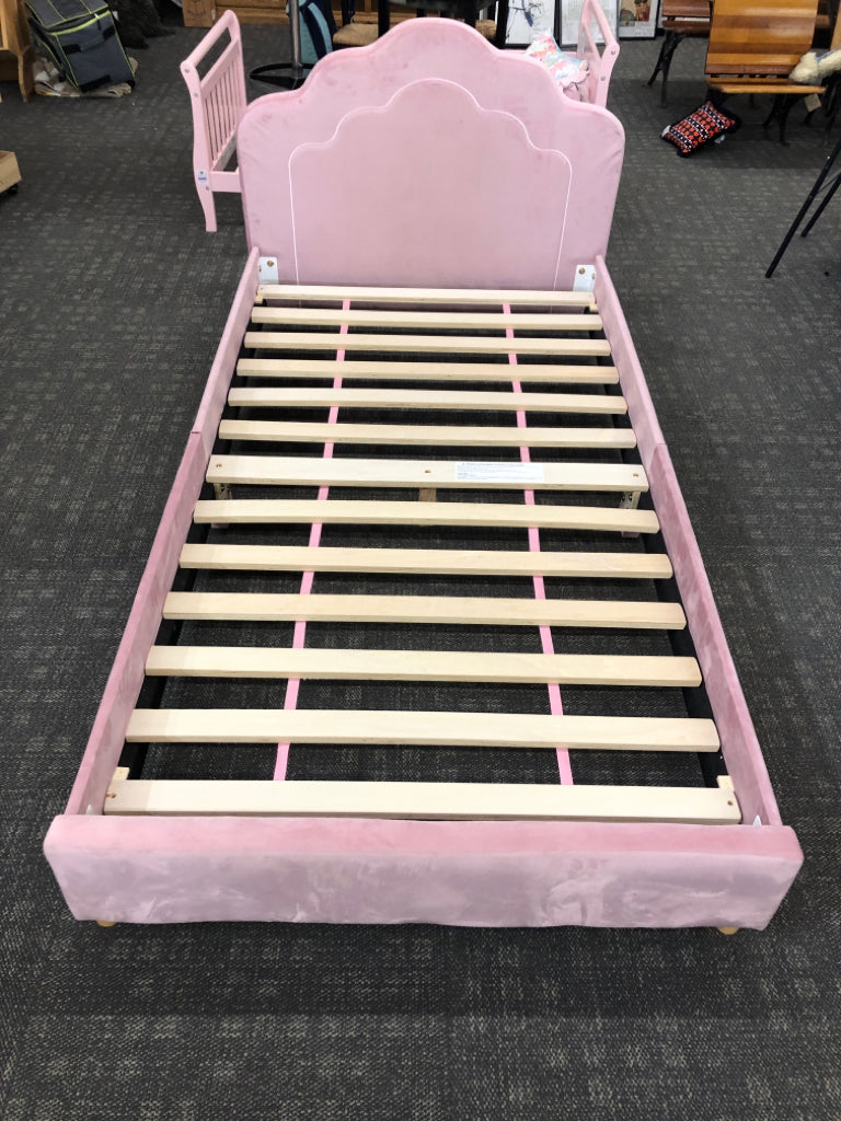 UPHOLSTERED PINK VELVET TWIN BED W/CLOUD-SHAPED HEADBOARD.