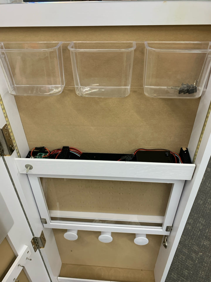 FULL LENGTH BODY MIRROR ON SWIVEL W/ JEWELRY STORAGE.