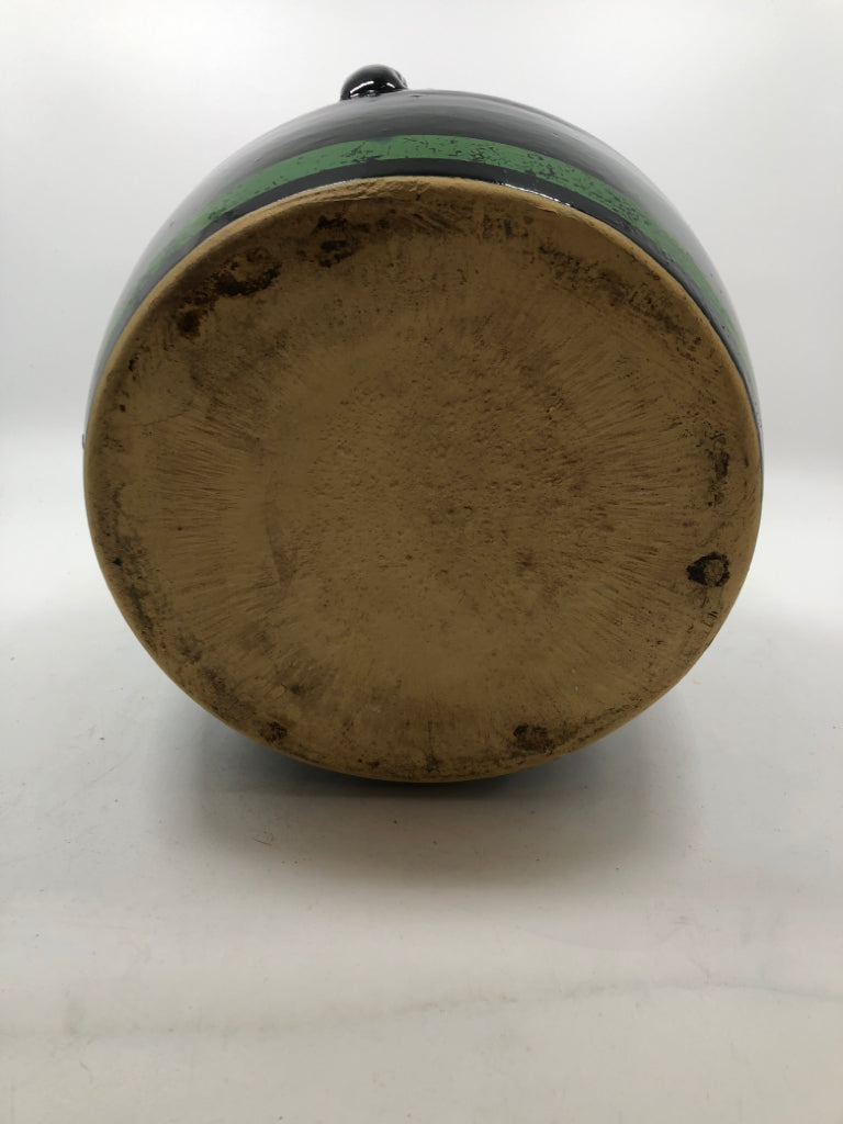 BLACK GLAZED JUG W/HANDLES AND GREEN.