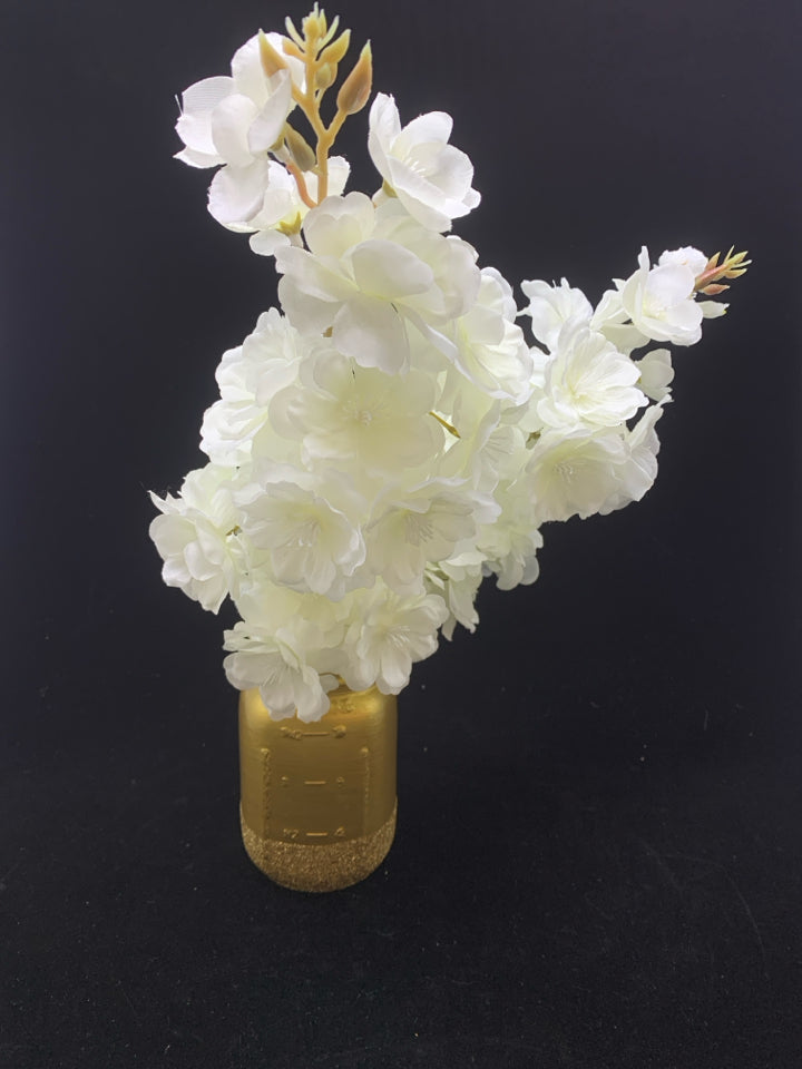 FAUX WHITE FLOWERS IN GOLD SPARKLE MASON JAR.