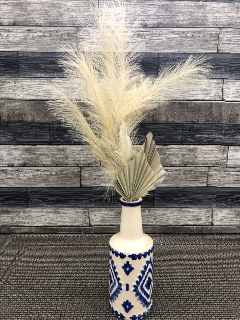 FAUX FERN IN BLUE/TAN CERAMIC VASE.