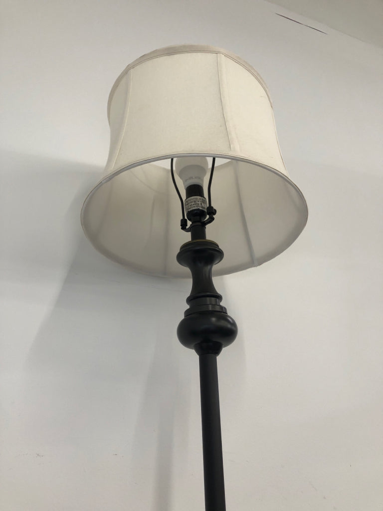 BLACK BASE FLOOR LAMP W CREAM SHADE.