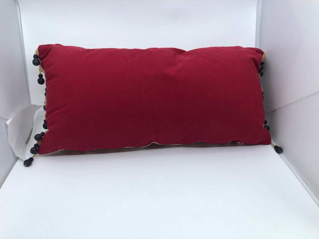 RED AND WHITE RECTANGLE ELEPHANT PILLOW.