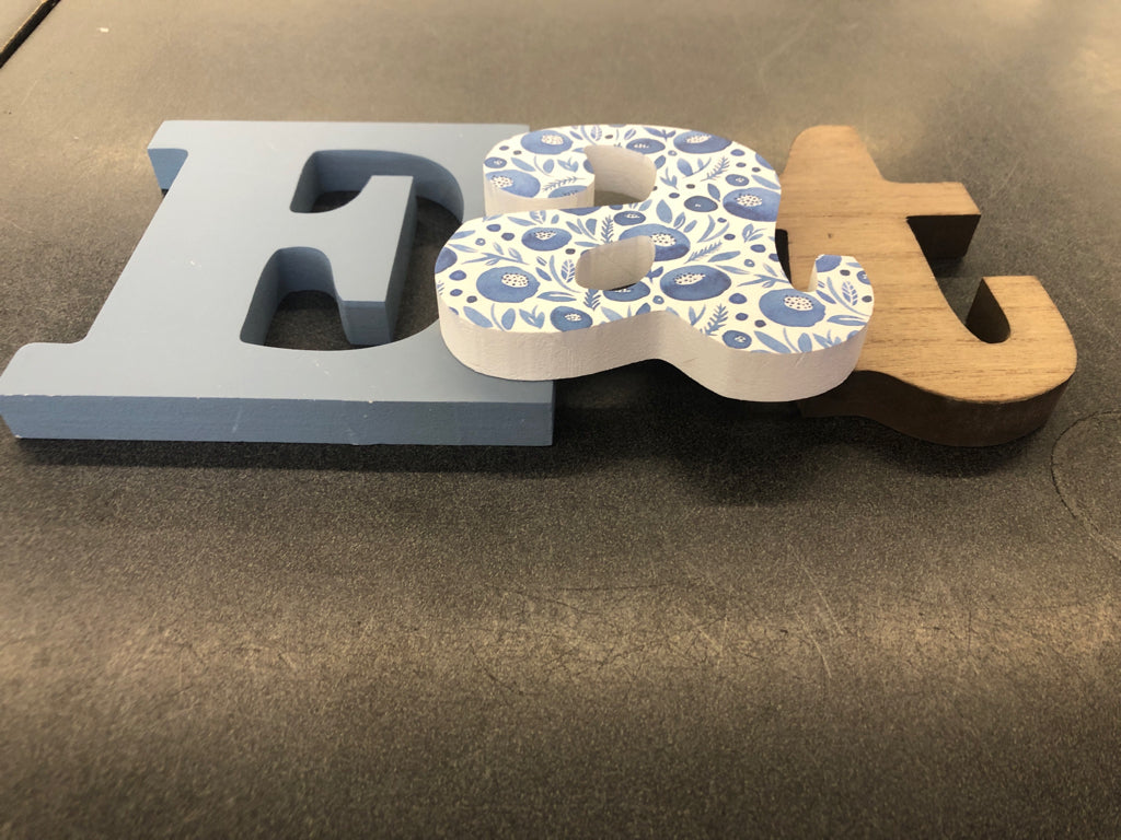BLUE AND WHITE EAT SIGN.