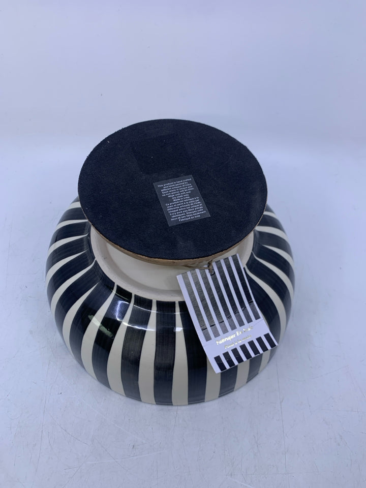 WOOD FOOTED BASE W/ BLACK/WHITE STRIPED CERAMIC BOWL.