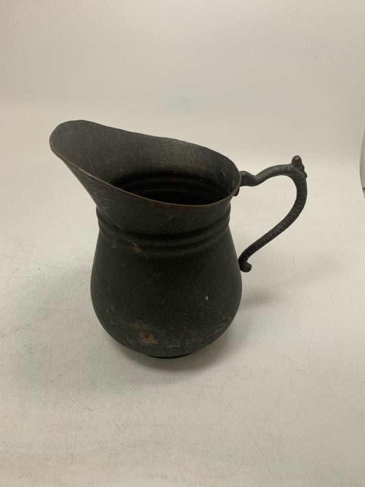 VTG METAL PITCHER W/ DETAILED HANDLE.