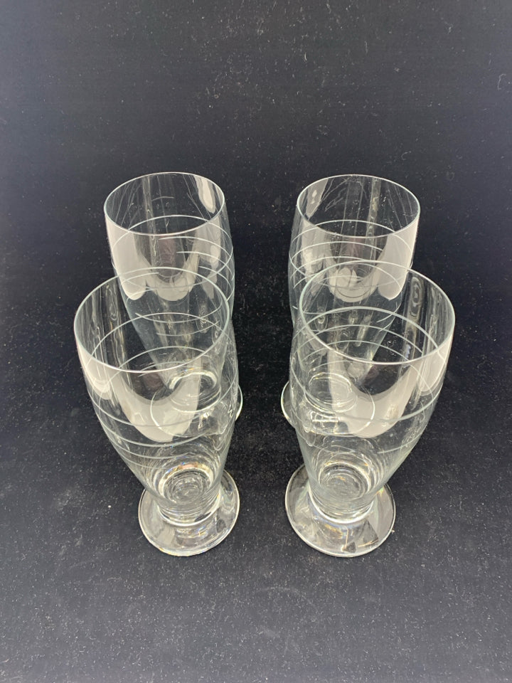 4 LARGE PILSNER GLASSES W/ ETCHED LINE DESIGN.