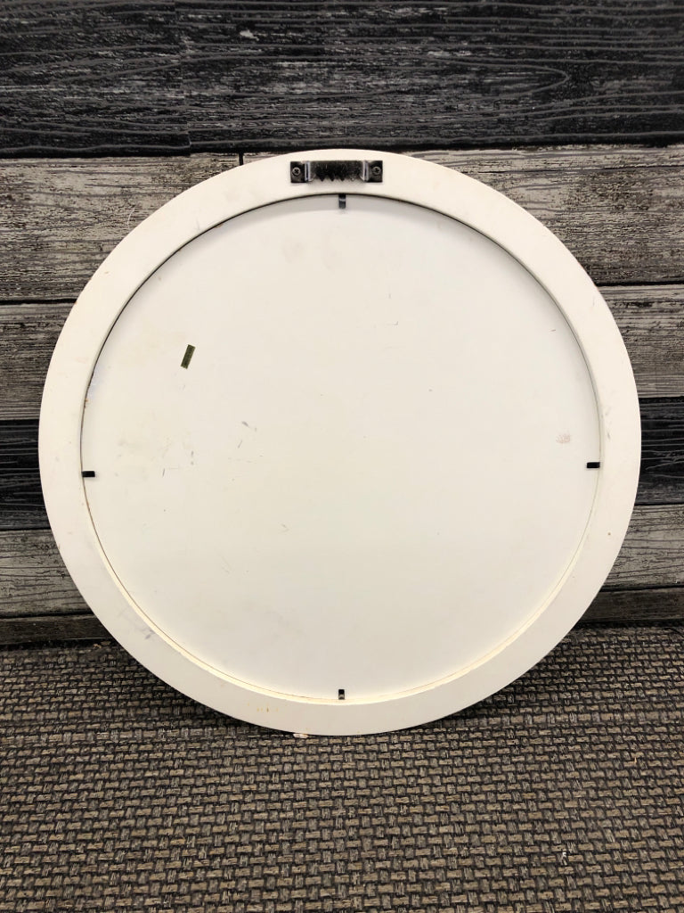 ROUND CREAM SCROLL MIRROR.