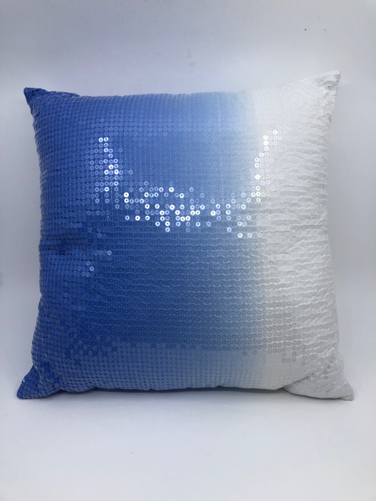 WHITE AND BLUE OMBRE SQUARE PILLOW.