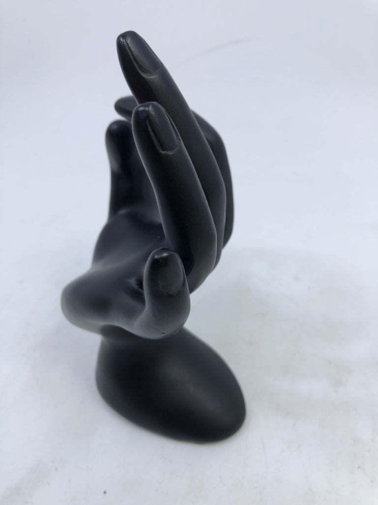 BLACK RESIN HAND RING HOLDER.