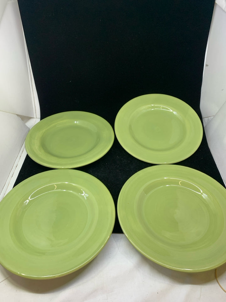 4 GREEN DINNER PLATES.