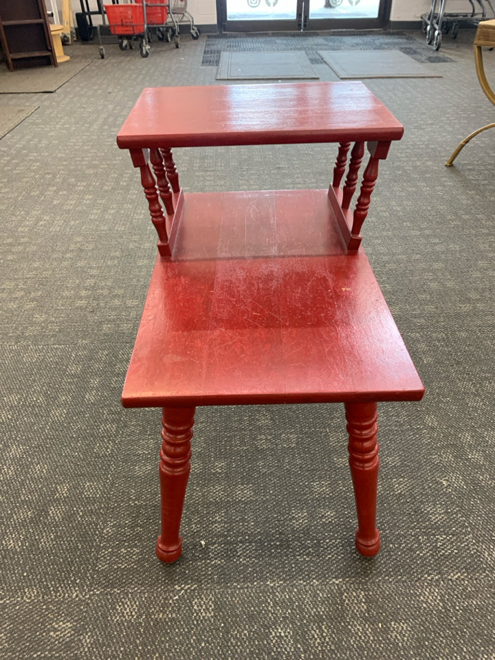 RED PAINTED END TALE WITH TOP SHELF.