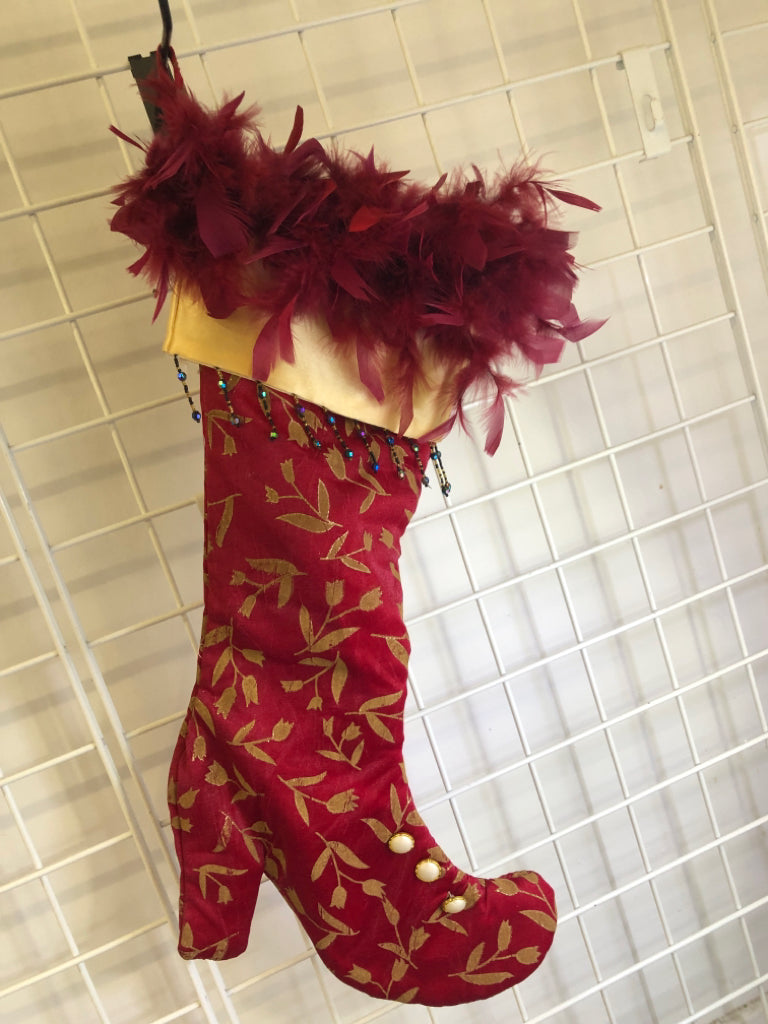 RED BOOT STOCKING W/FEATHERS.