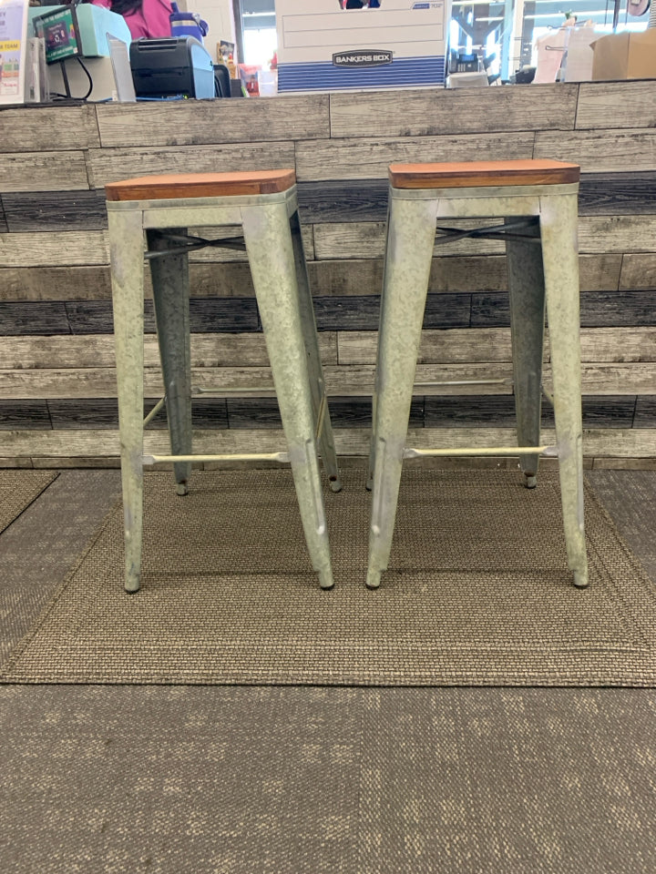 2 GALVANIZED WOOD TOP STOOLS.