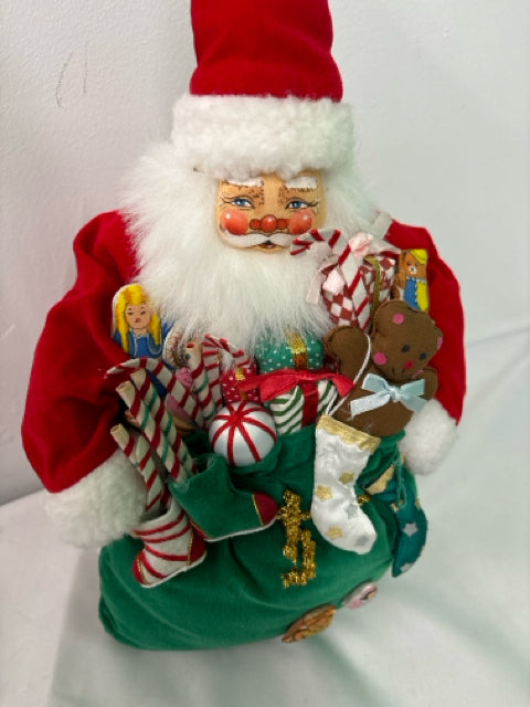 PLUSH STANDING SANTA WITH TOY SACK.