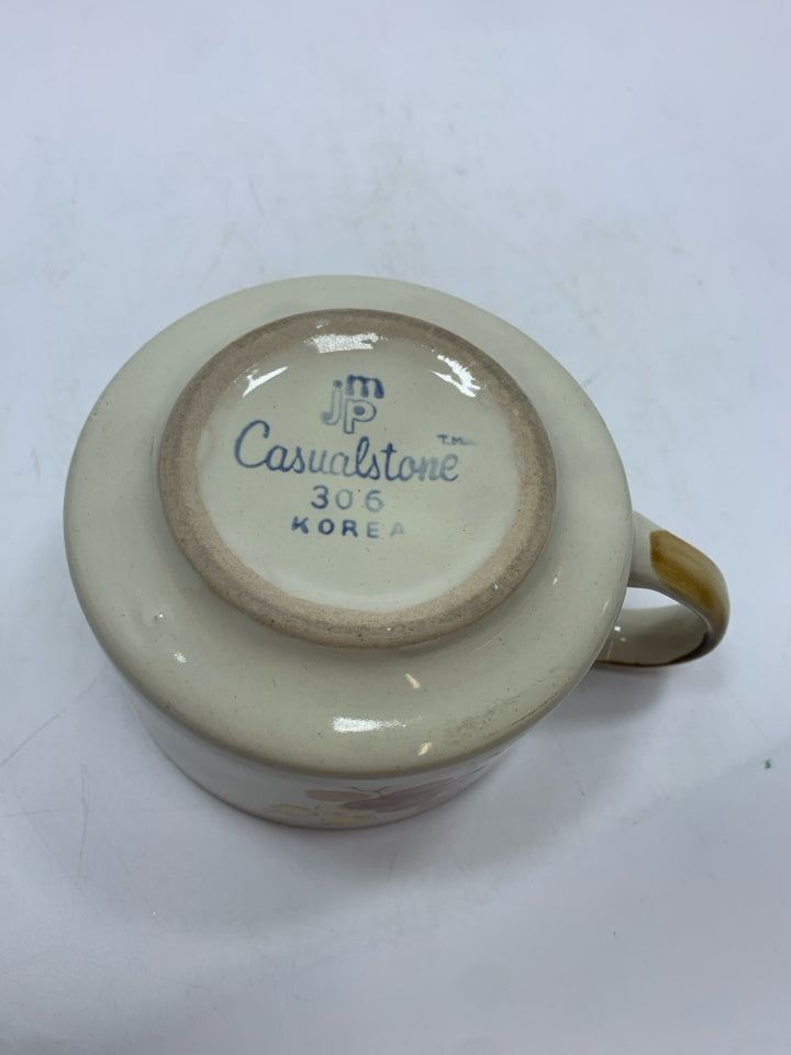 VTG TAN FLORAL MUG.