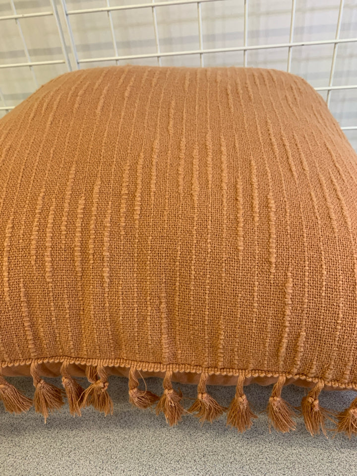 PINK BOHO PILLOW W/TASSELS.