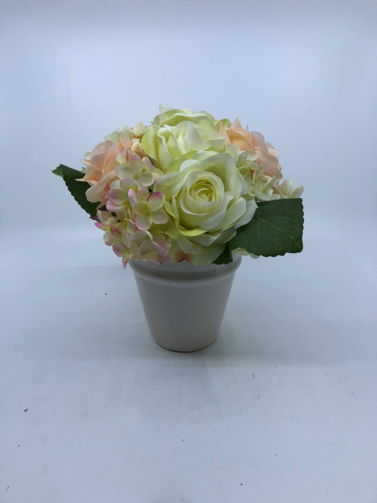 CREAM PLANTER W/PINK AND PEACH FLOWERS.