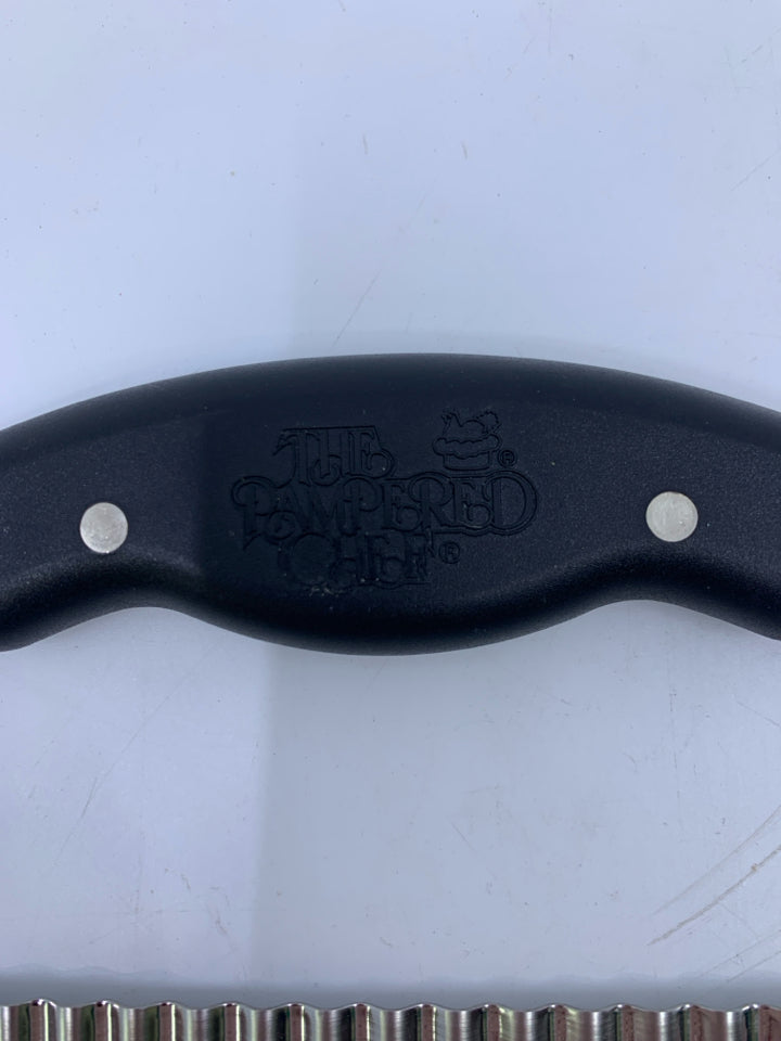 METAL GARNISHER CHOPPER/CUTTER W/ SAFETY SLEEVE.