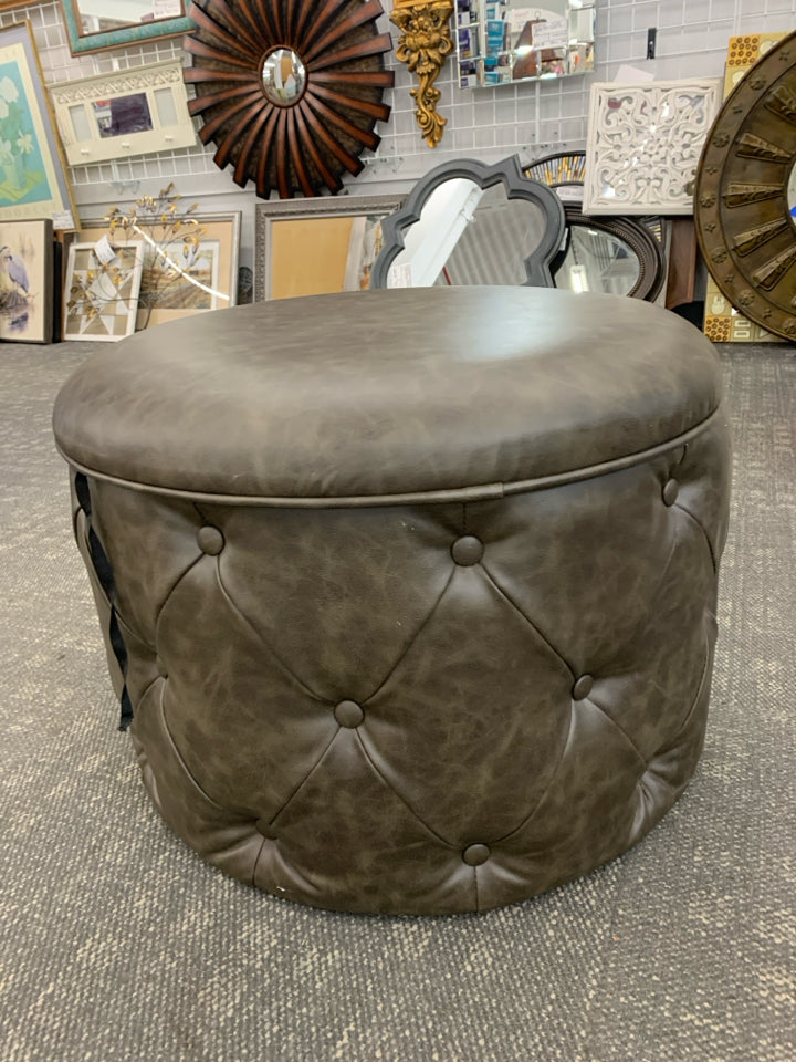 BROWN LEATHER TUFTED OTTOMAN W/SHOE STORAGE.