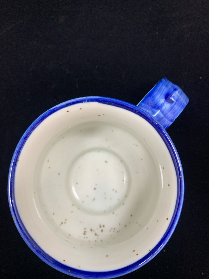 BLUE CERAMIC DOTTED MUG W/ORANGE FLOWERS.