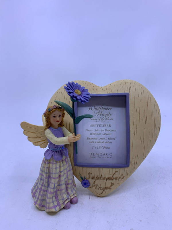 SEPTEMBER ANGEL W PURPLE FLORAL AND HEART FRAME.