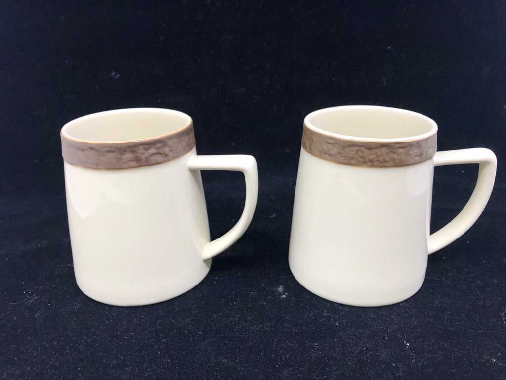 2 RUSTIC CREAM MUGS W/ BROWN TEXTURED RIM.