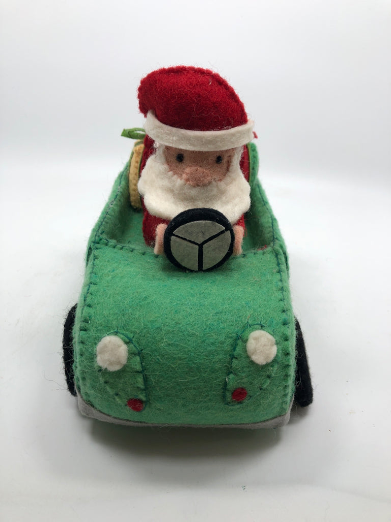 FELT GREEN BUGGY CAR W/ SANTA DRIVING.