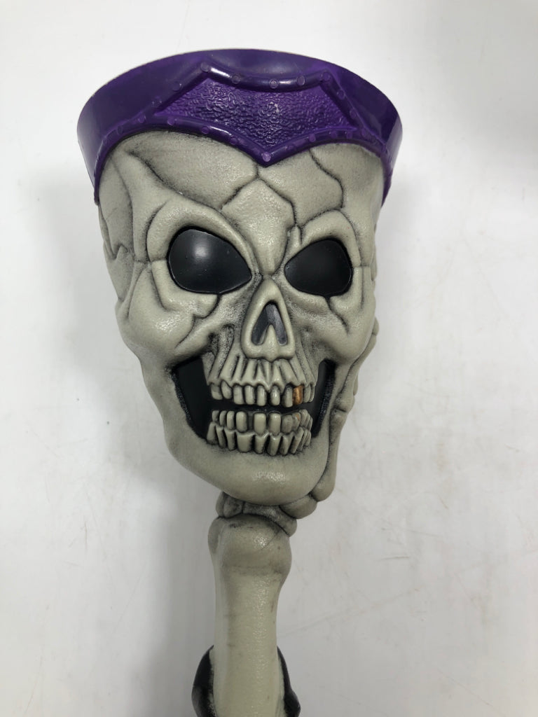4 GRAY & PURPLE SKULL GOBLETS.
