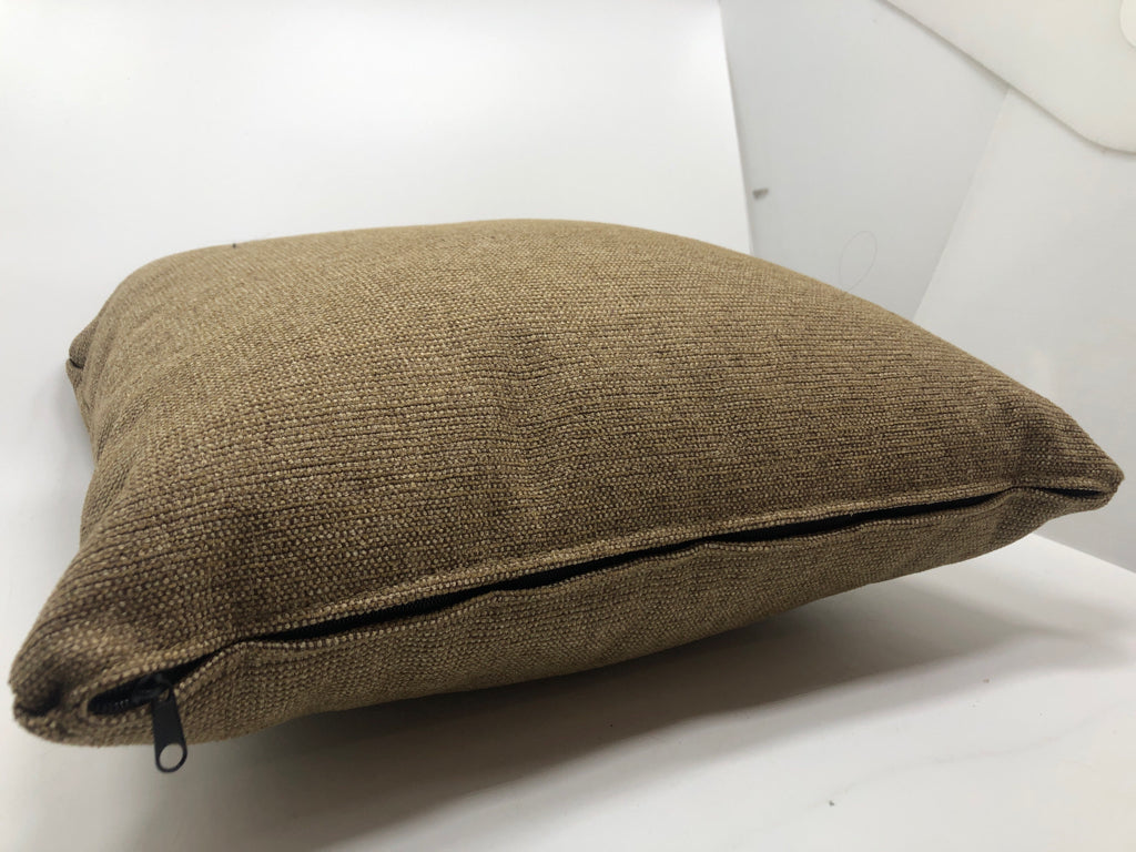 BROWN FABRIC PILLOW.