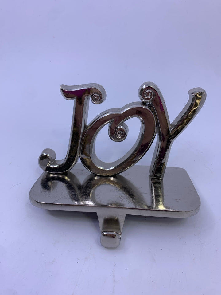SILVER "JOY" STOCKING HOLDER.