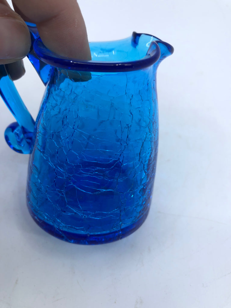 FLARED EDGE BLUE CRACKLE GLASS PITCHER.