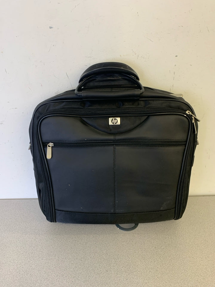 BLACK FAUX LEATHER COMPUTER BAG.