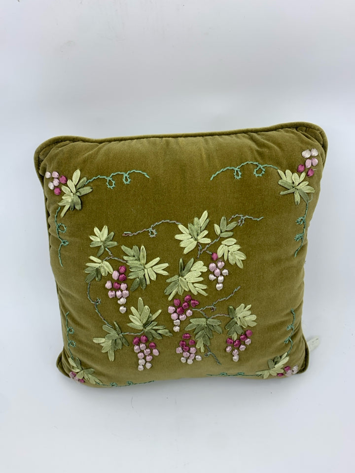 GREEN EMBROIDERED PILLOW.