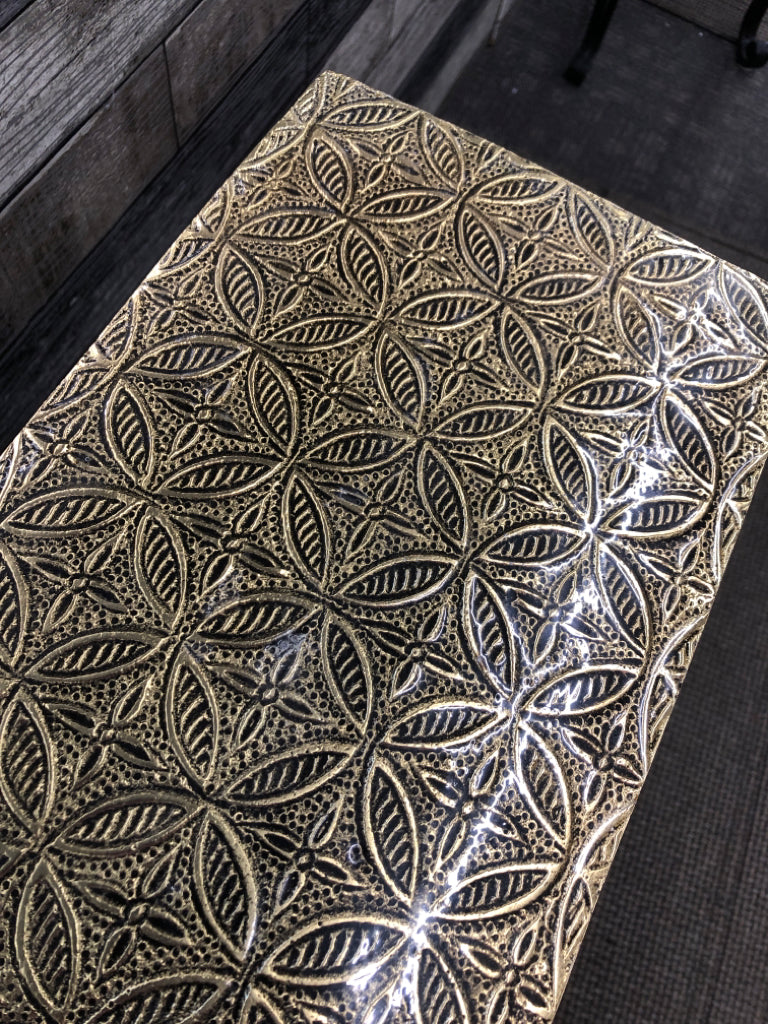 NARROW TABLE W/ GOLD ETCHED CERAMIC TOP & METAL SIDES.