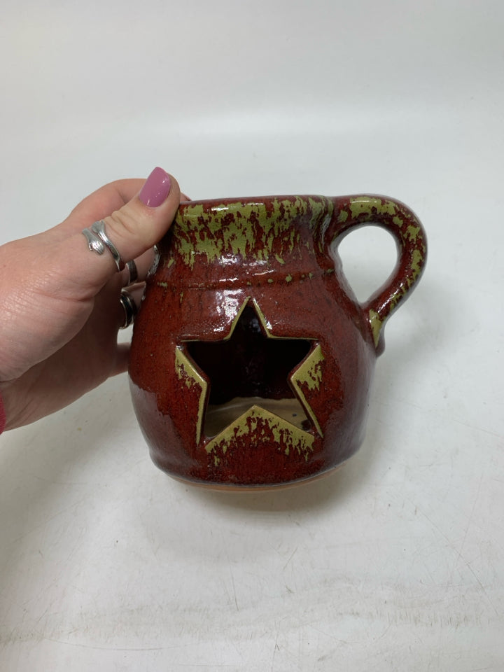DISTRESSED CROCK W/ STAR CUTOUT/HANDLE CANDLE HOLDER.