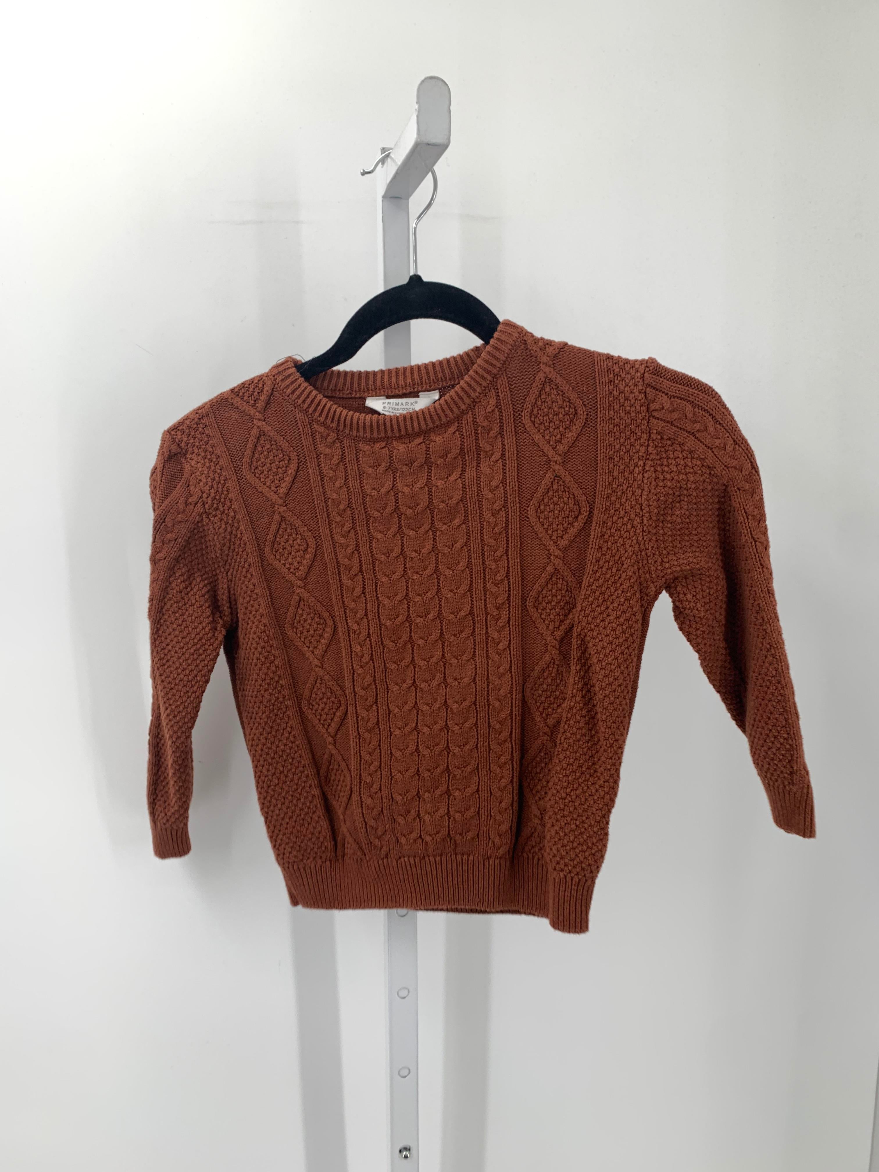 CABLED SWEATER