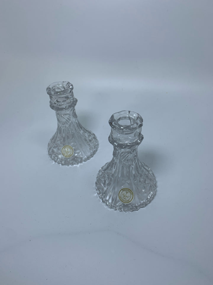 2 FOOTED CRYSTAL TAPERED CANDLE HOLDERS.