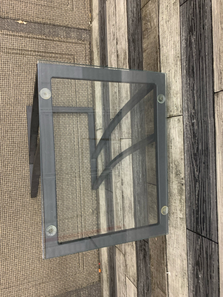 SMALL BLACK METAL GLASS TOP TV TABLE.