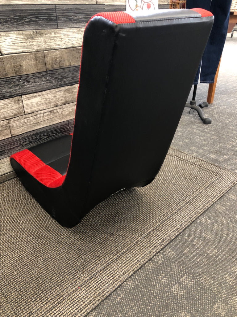 BLACK AND RED GAMER CHAIR.